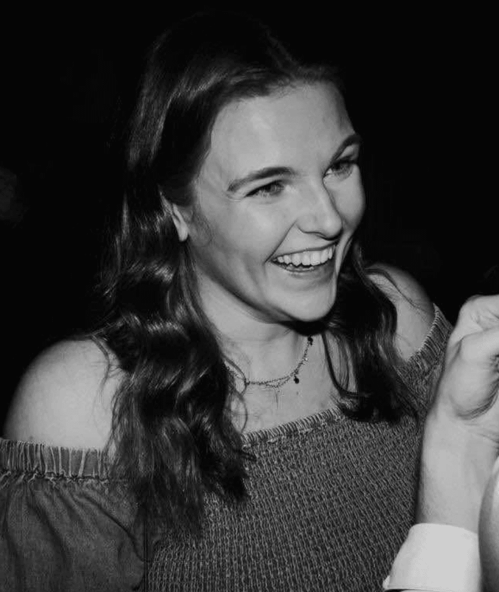 Georgina, physiotherapist at Carter & George Clinic in Hitchin, enjoying her time outside of work, smiling and having fun.