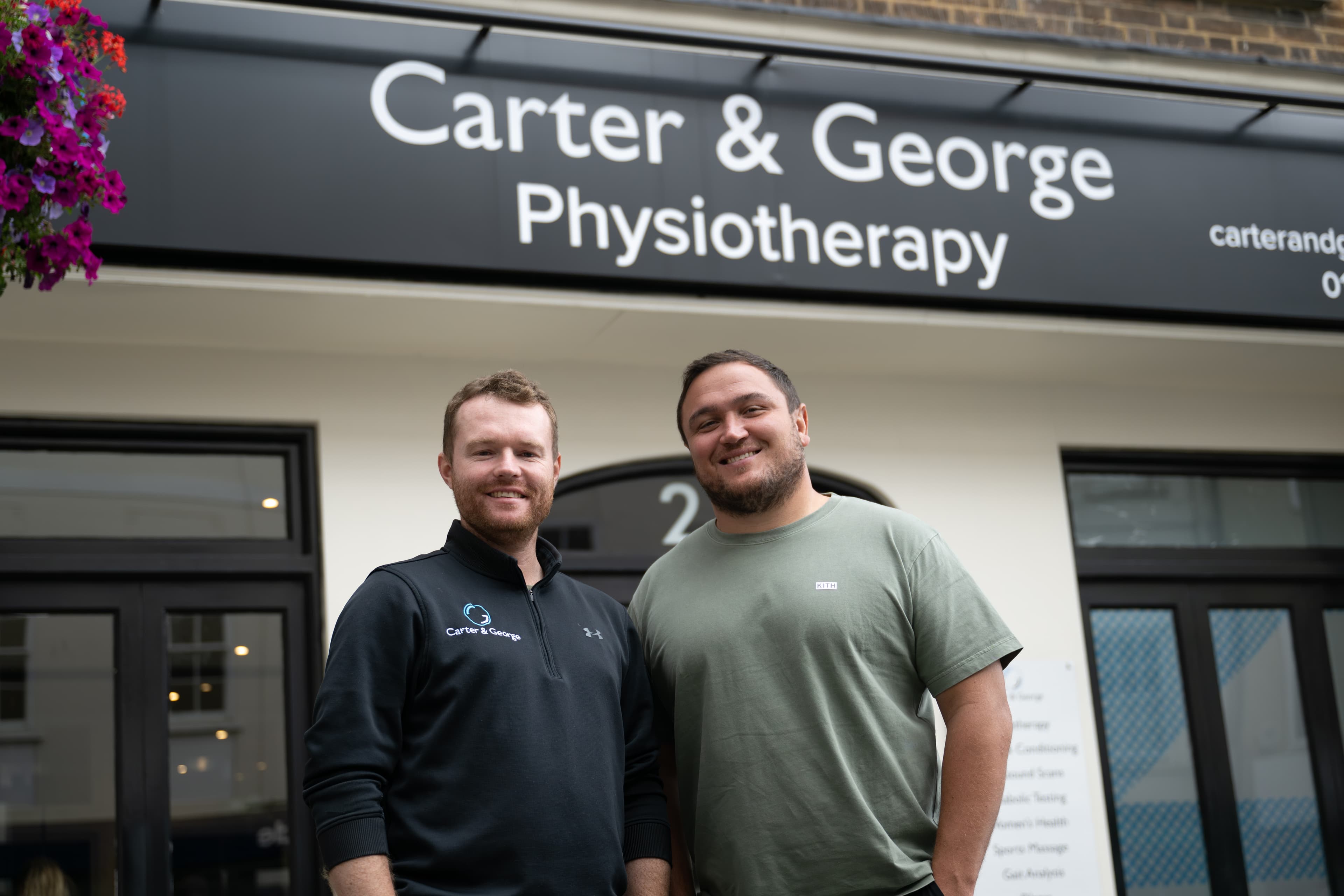 Jamie George and Rhys Carter standing outside the Hertford practice