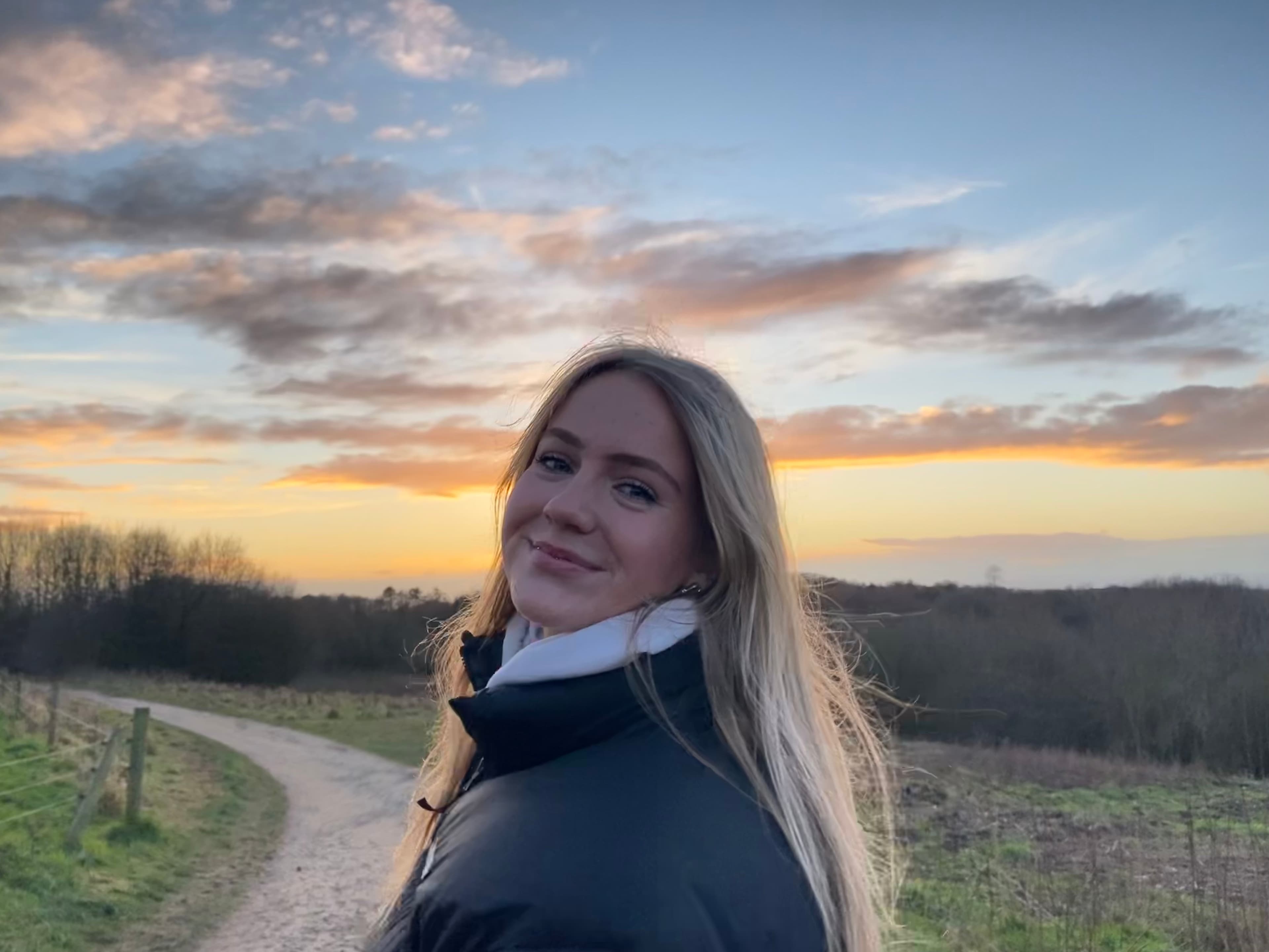 Molly Rudd, Physiotherapist at Carter & George Clinic in Congleton, enjoying her time outside of work, smiling and having fun.